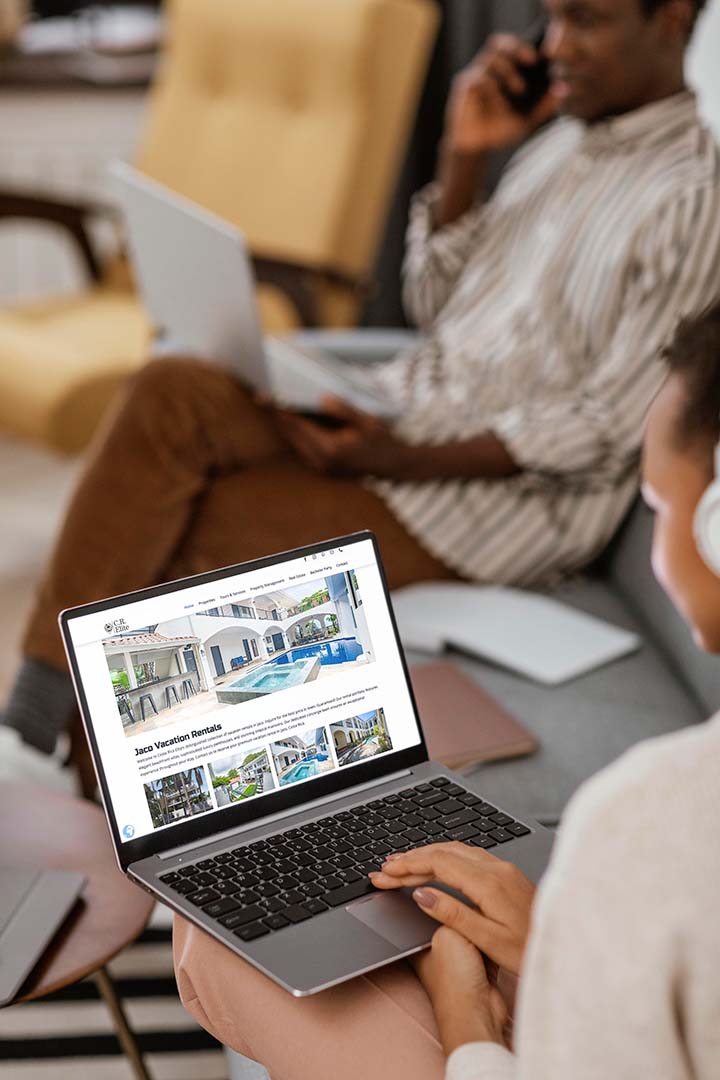 People at Internet cafe, viewing website design by Pacific